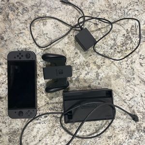 Nintendo switch grey WITH TONS OF GAMES.